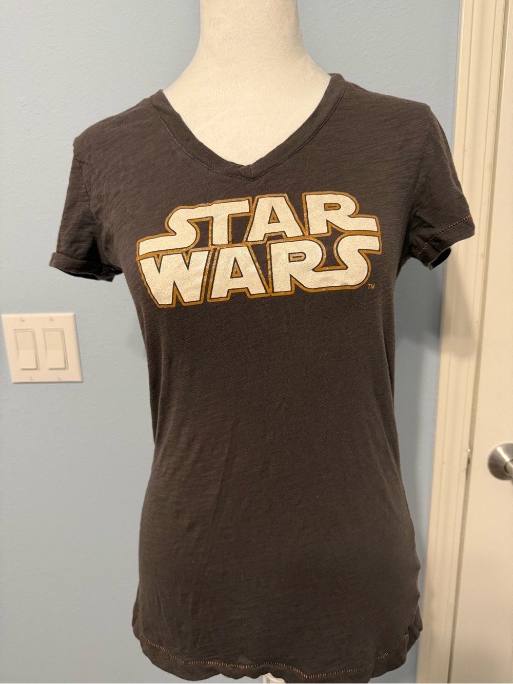 Star Wars Women's Black V-Neck Tee with White and Gold Logo